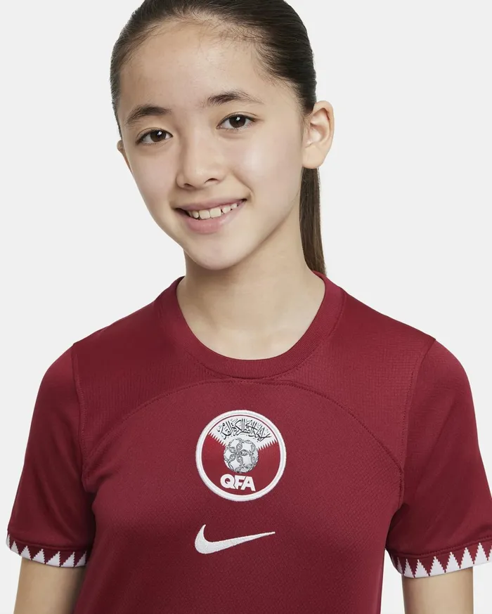 All Clothing Kids Nike Qatar 202223 Stadium Home Desert Maroonwhite